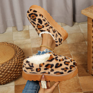 black boots featuring faux fur lining and leopard-print