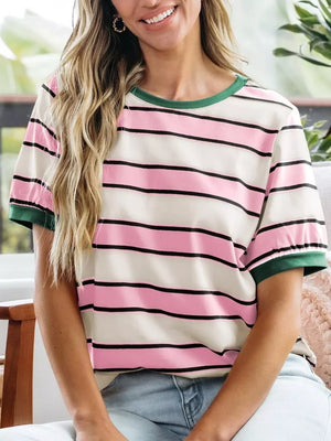 Striped crew neck t-shirt with pink, cream, and black horizontal stripes and green trim.