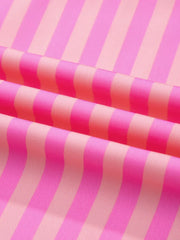 Vibrant stripe ruffled neck summer blouse with cap sleeves in pink and light pink.