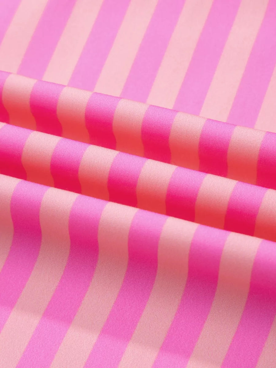Vibrant stripe ruffled neck summer blouse with cap sleeves in pink and light pink.