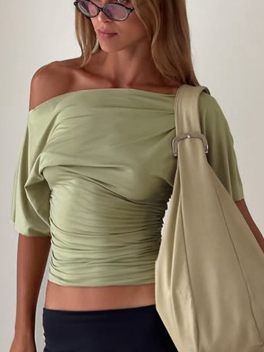 Sage ruched one shoulder t-shirt with asymmetrical neckline and short sleeves.