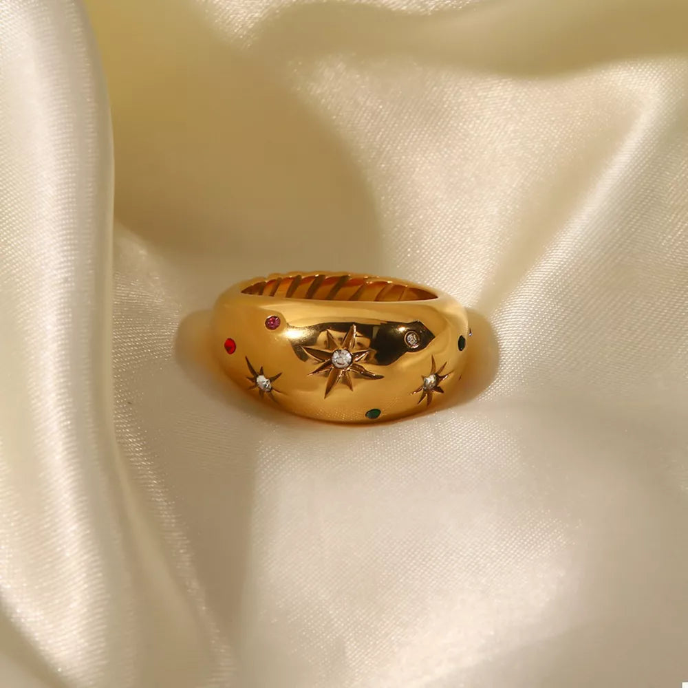 Gold ring featuring gold-plated and celestial