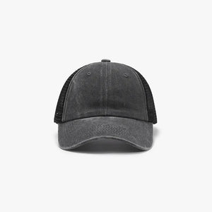 Dark gray vintage wash trucker hat with black mesh back.