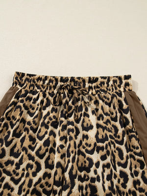 Leopard print two-piece set with drawstring waist and brown side panels.