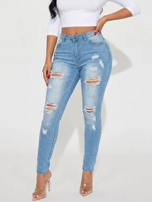 medium blue skinny jeans with full-length and button and zip fly