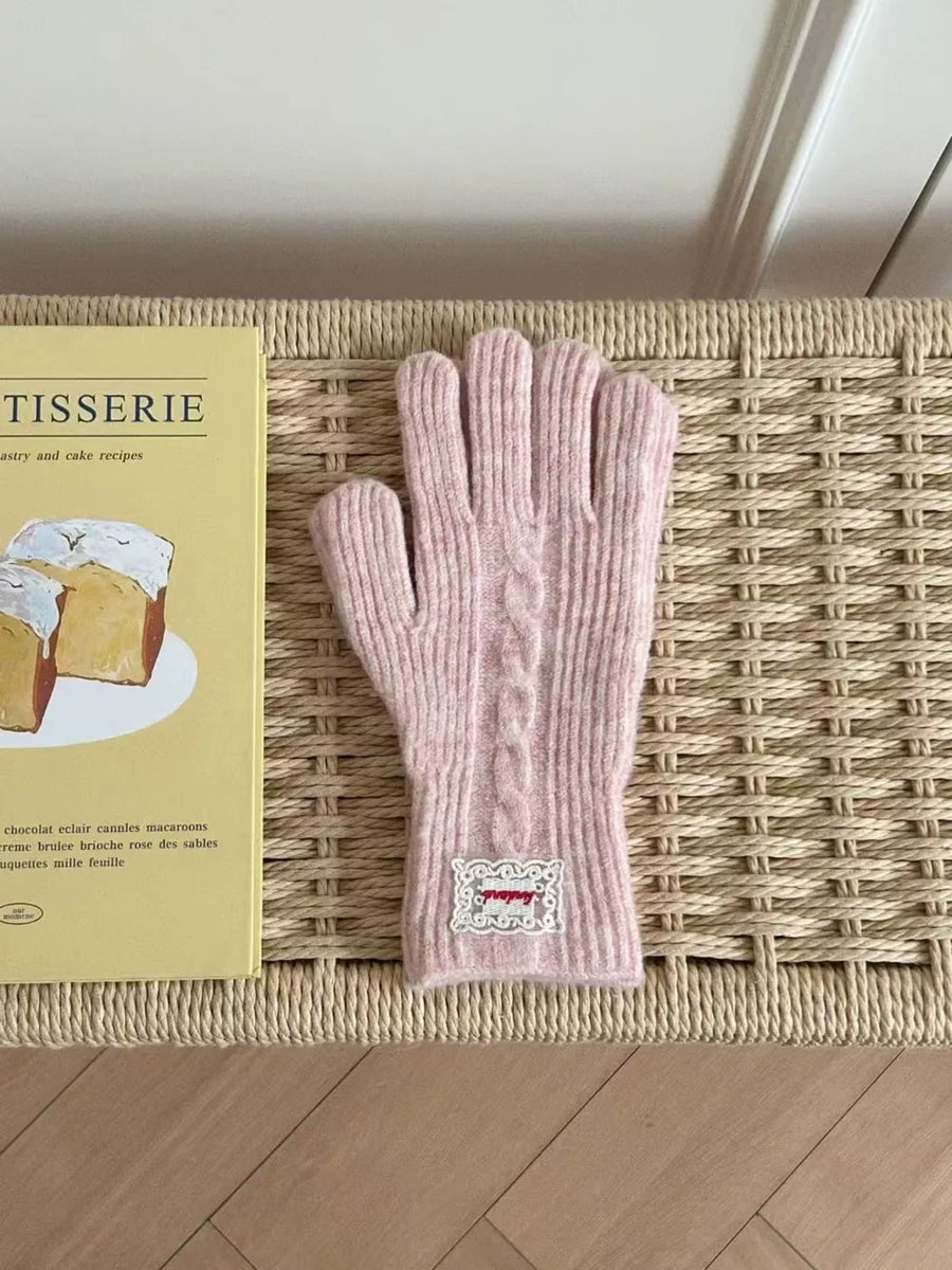 Pink cable knit acrylic gloves with embroidered patch detail