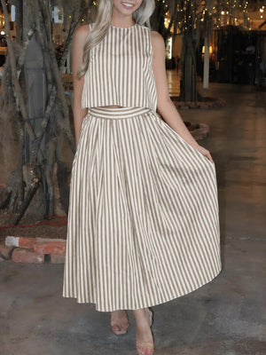 Buttoned two-piece set in khaki stripe with crop top and pleated midi skirt.