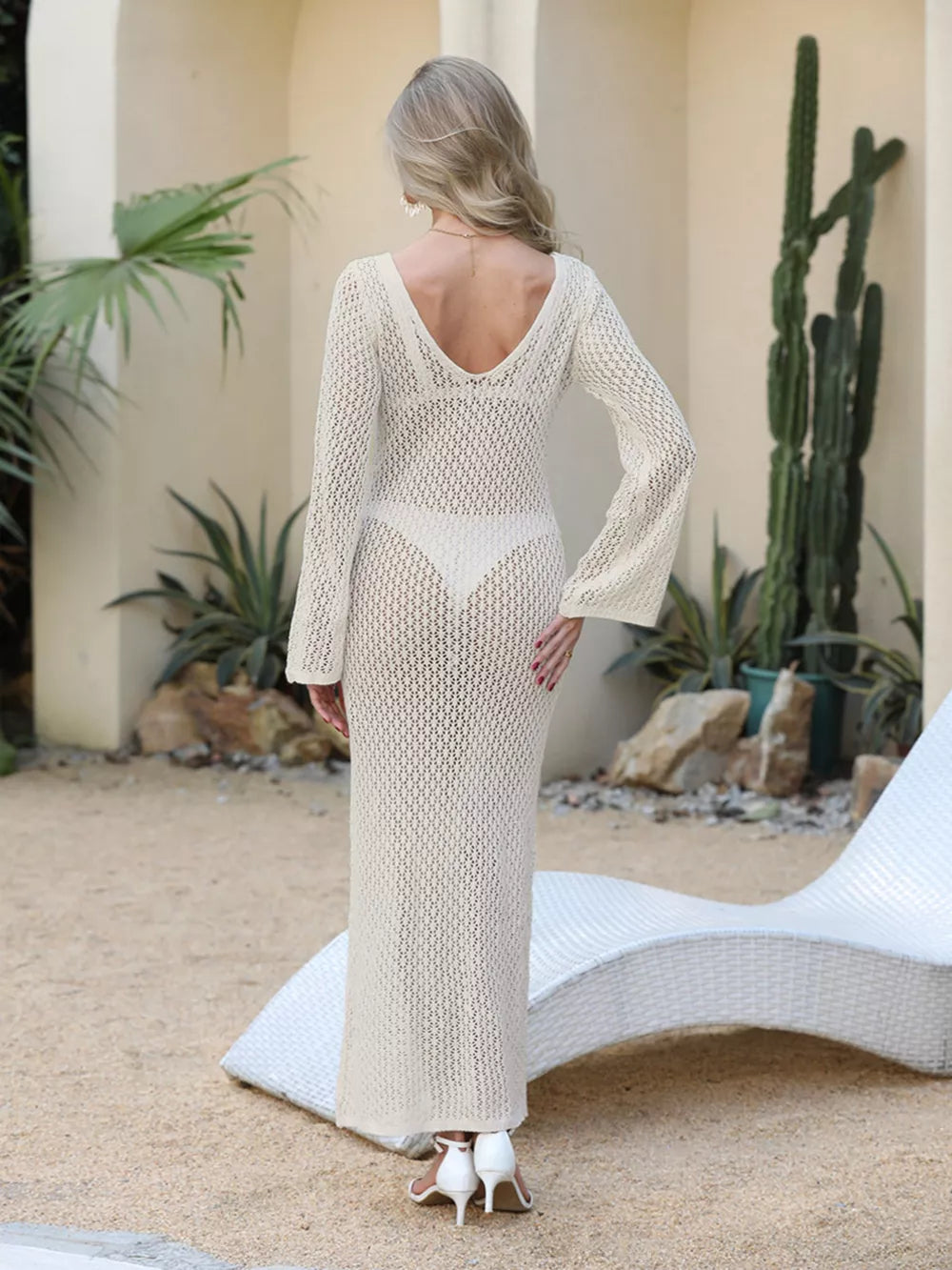 Chic openwork maxi cover-up dress in white with long bell sleeves and a V-neck.
