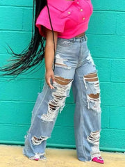 Distressed light wash denim wide-leg maternity jeans with drawstring waist and extreme rips.