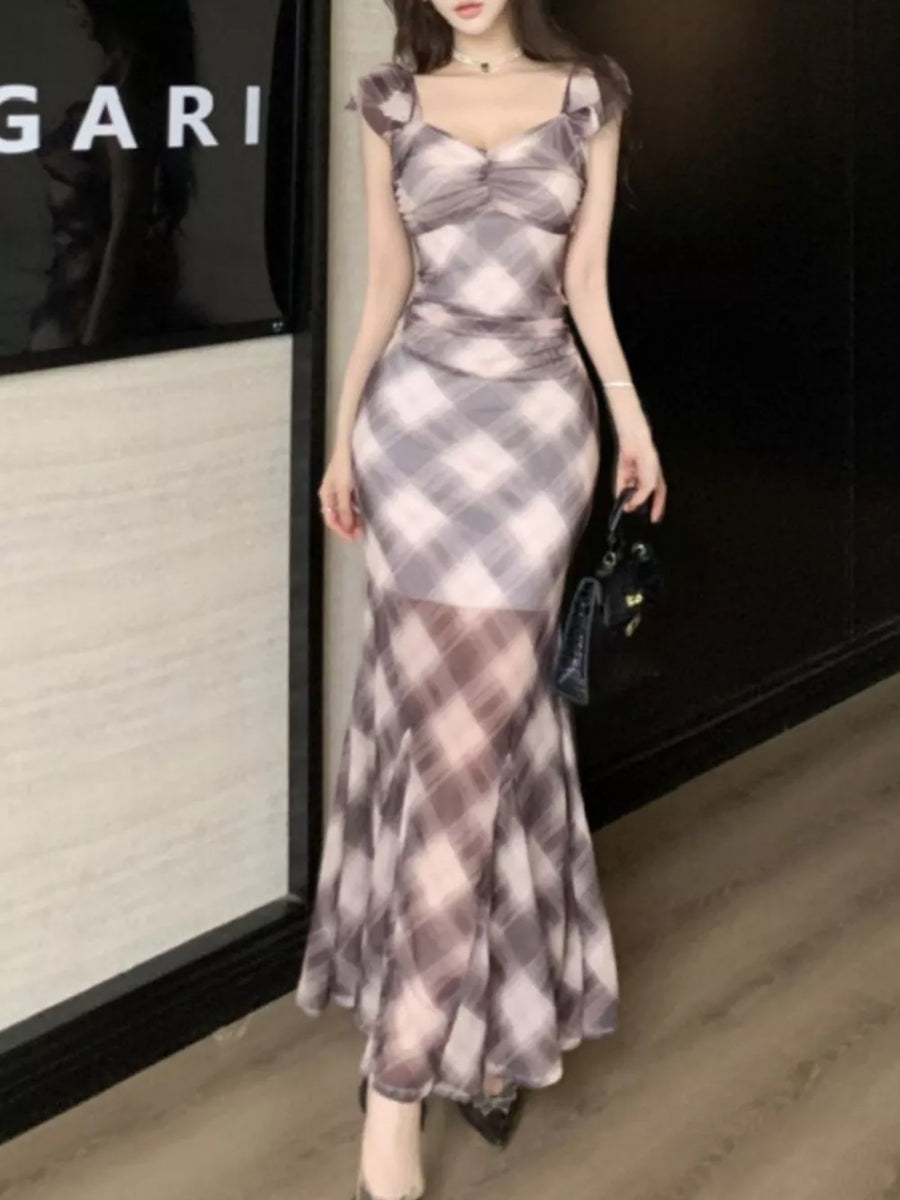 Ruched plaid bodycon maxi dress in brown with sweetheart neckline and sheer mermaid skirt.