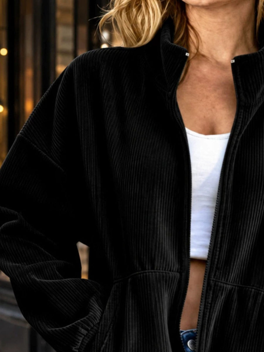 95% polyester, 5% spandex Care instructions: Machine wash cold bomber jacket in Black with relaxed silhouette