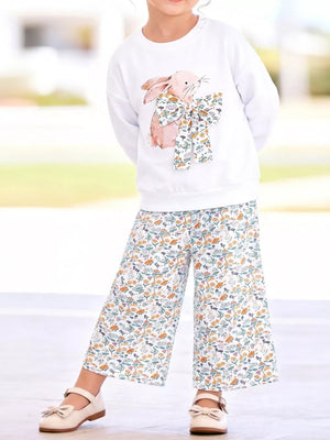 white sweatshirt and pants set with graphic, floral and crew neck