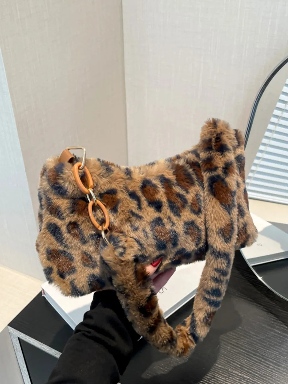 Leopard print faux fur shoulder bag with chain detail