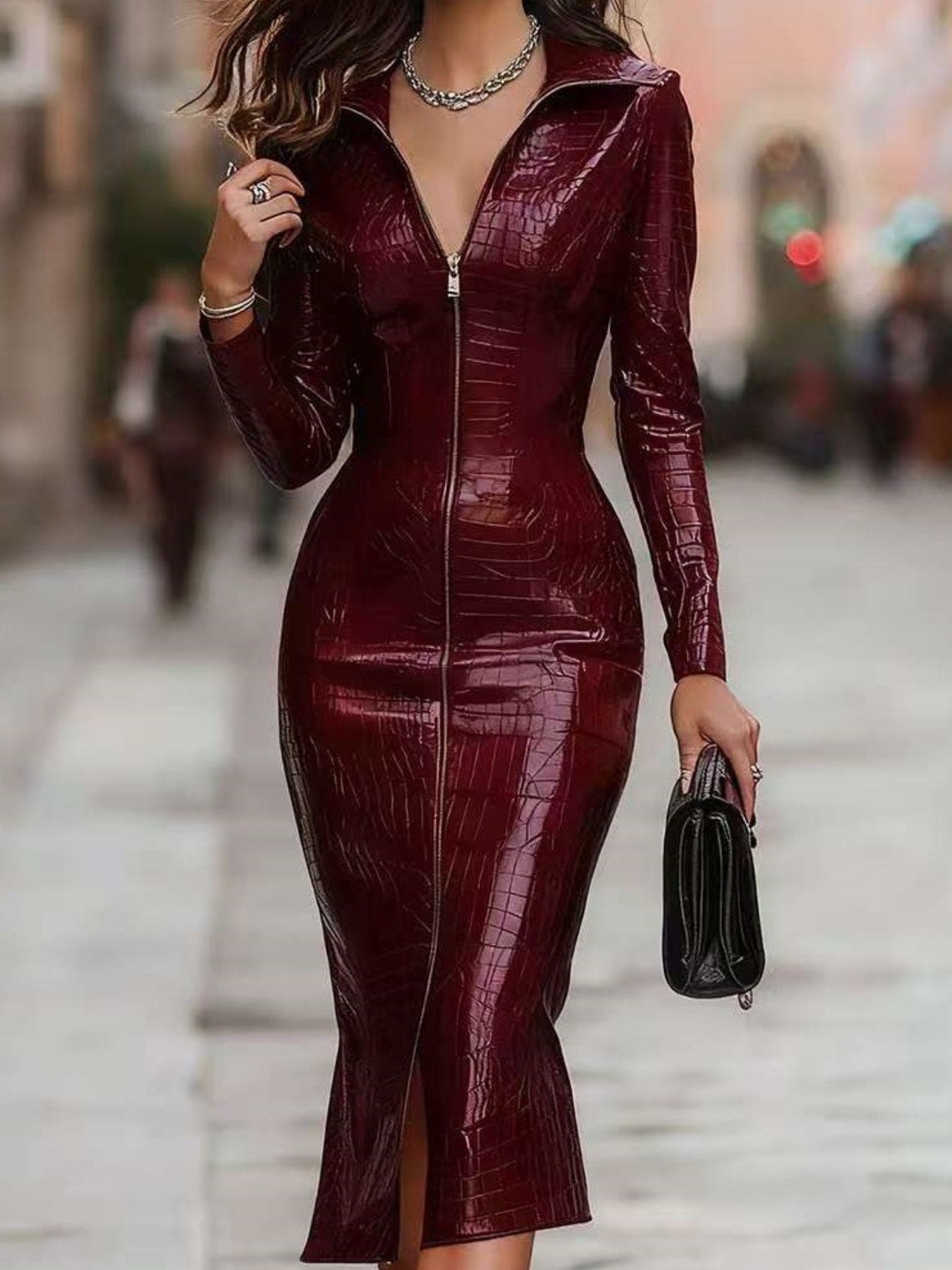 Burgundy crocodile-embossed bodycon midi dress with zip front and collar.