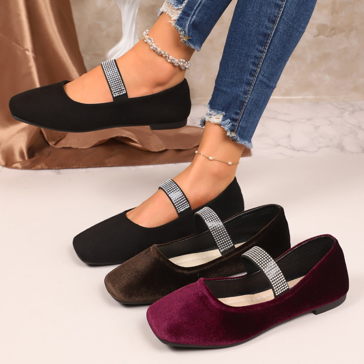 Elegant square toe slip-on flats in black, brown, and fuchsia pink with rhinestone straps.