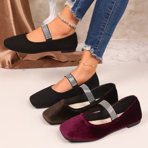 Elegant square toe slip-on flats in black, brown, and fuchsia pink with rhinestone straps.