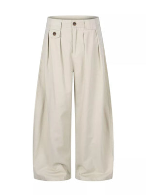 wide-leg pants in beige featuring pleated front and wide-leg fit