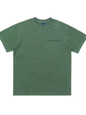 Green oversized graphic tee with a small chest graphic and crew neck.