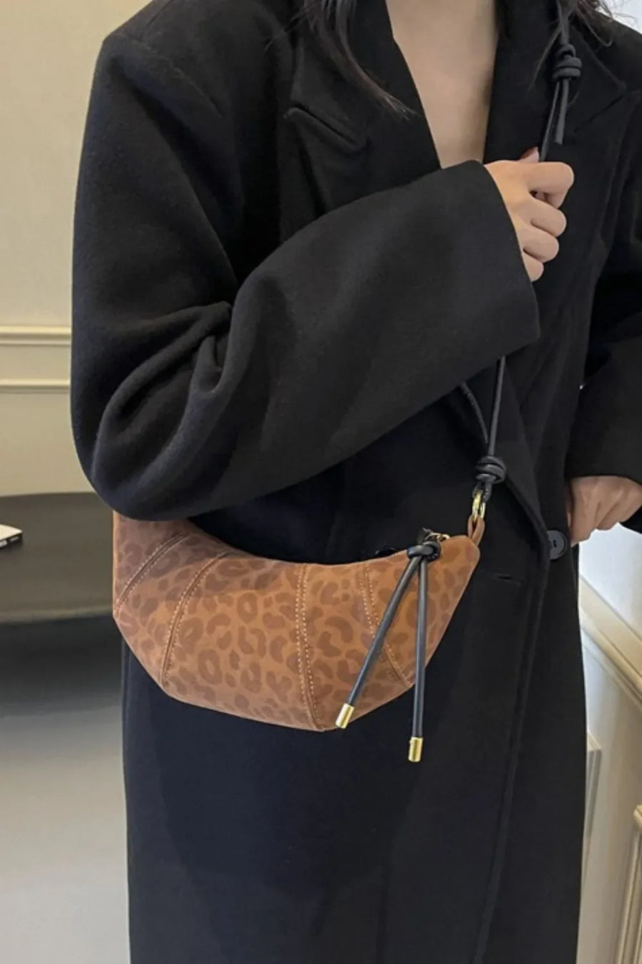 Brown leopard print crescent shoulder bag with knot detail