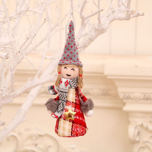 Festive fabric doll ornament with red plaid dress, gray heart hat, and scarf.