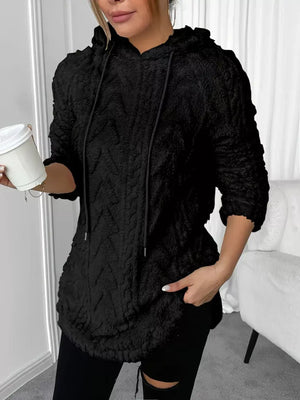 Black textured fleece hoodie with drawstring and relaxed fit.