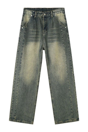 Faded wash baggy carpenter jeans in medium color with a relaxed fit.