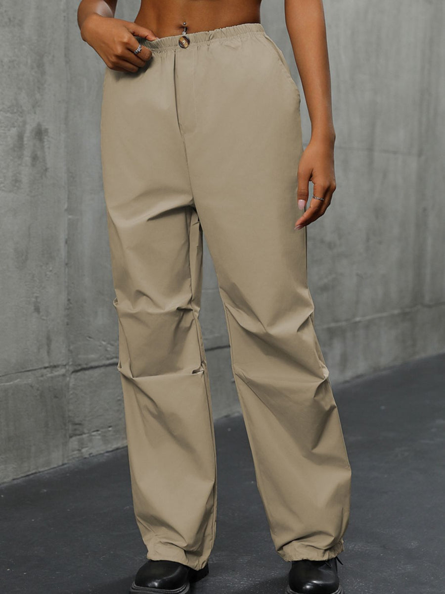 Khaki gathered-leg utility trousers with cuffed ankles and a comfortable fit.