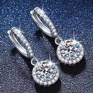 earrings in clear with moissanite stones and short