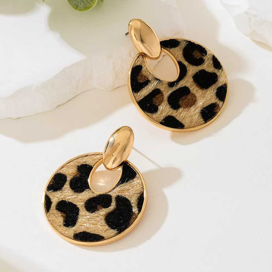 black earrings featuring dangle and leopard-print