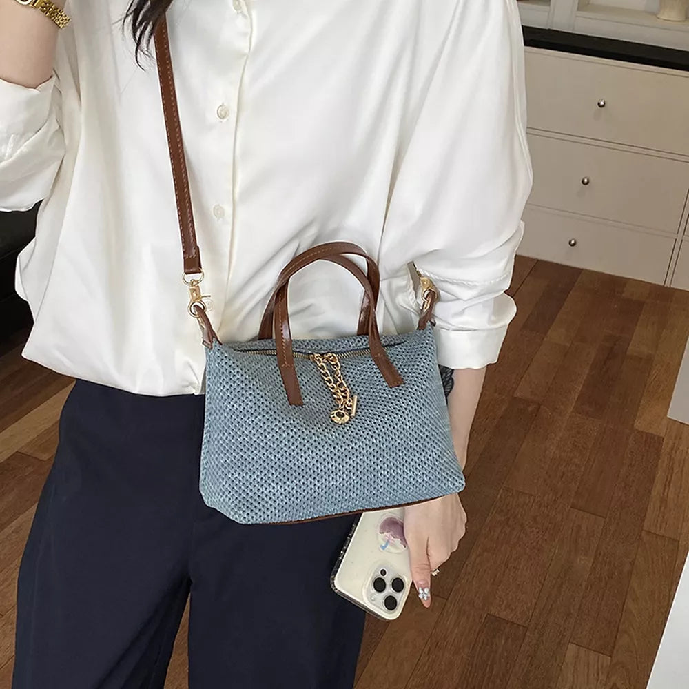 Woven Crossbody Bag With Leather Accents in brown with woven texture