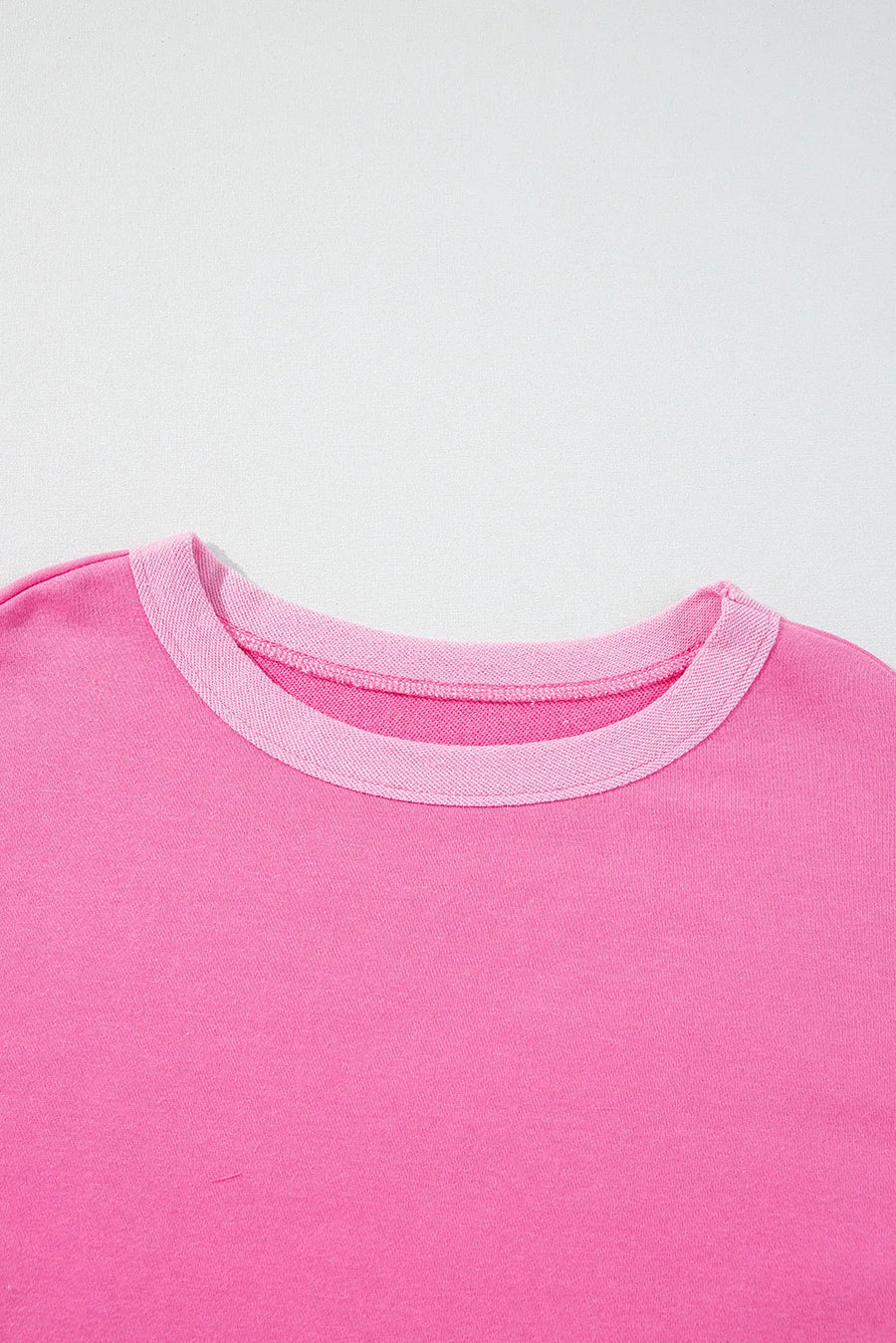Fuchsia pink cotton loungewear top with contrast trim crew neck.