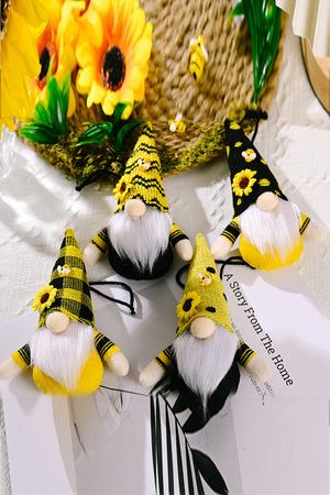 Bee-themed gnome ornaments in yellow with sunflowers and bumblebee accents.