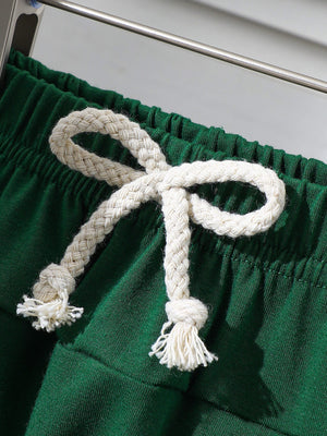 Dark green cotton baby shorts with drawstring detail
