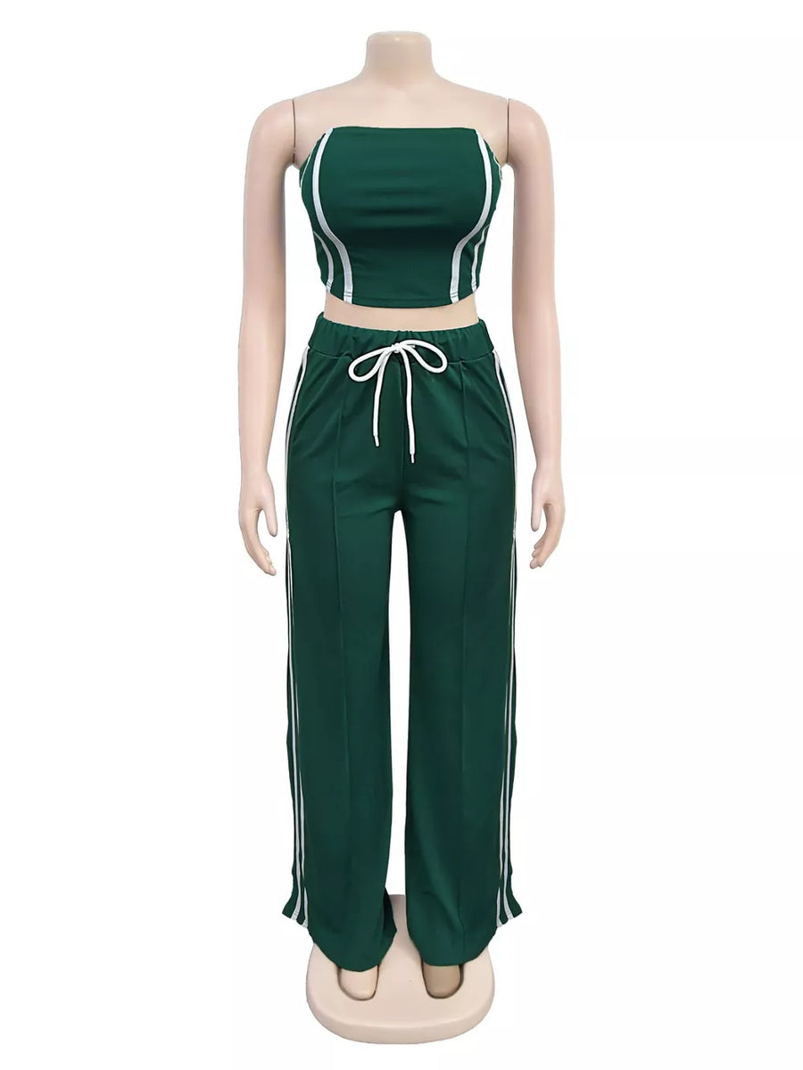 Dark green tube top and wide-leg pant set with white piping and drawstring waist.
