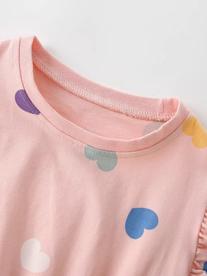 Pink cotton blend baby dress with colorful heart print and ruffled sleeve detail.