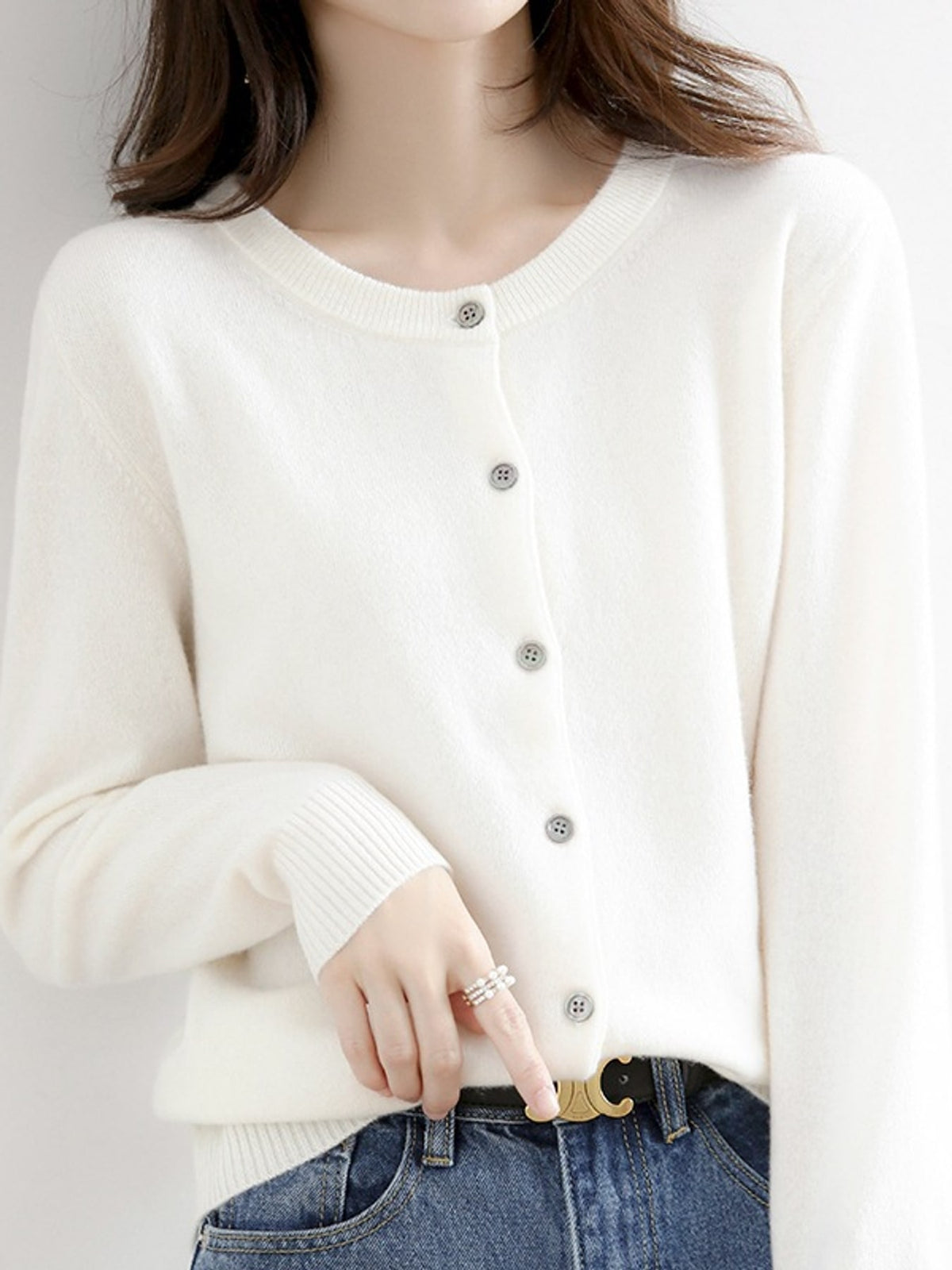 cardigan in ivory featuring buttoned and relaxed fit
