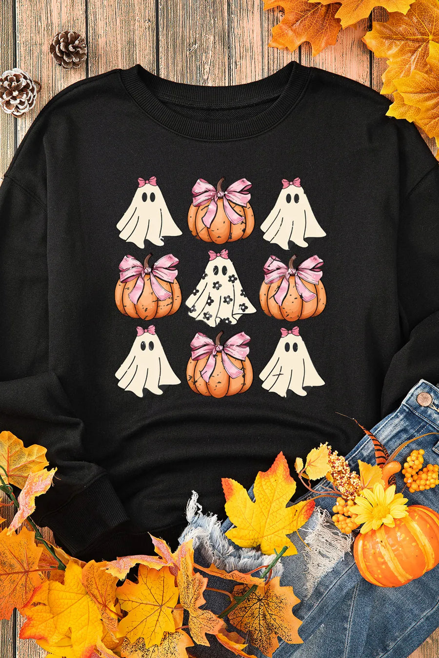 Black crewneck sweatshirt with a grid of Halloween ghosts and pumpkins graphic.