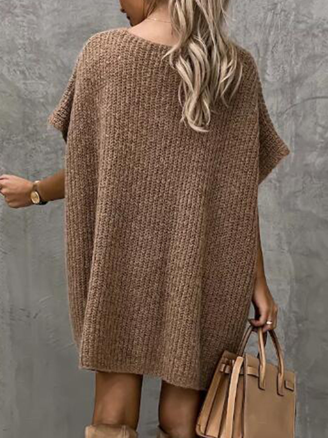 Relaxed knit tunic in taupe with short sleeves and a relaxed fit.