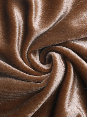 Brown velvet fabric with soft texture and draped folds.