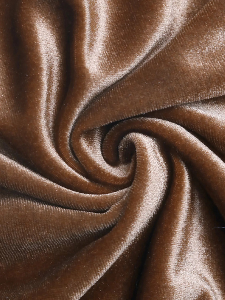 Brown velvet fabric with soft texture and draped folds.