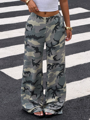 wide-leg pants in olive green featuring elastic waist and loose fit