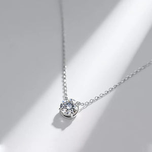 Radiant moissanite pendant necklace in sterling silver with a delicate chain.