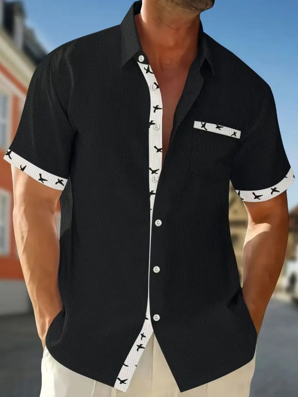 Black waffle weave short sleeve shirt with airplane print contrast trim
