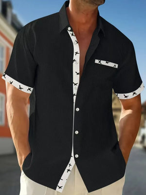 Black waffle weave short sleeve shirt with airplane print contrast trim