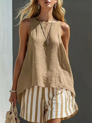 Tank top in tan gauze with a round neck, paired with striped shorts in white and tan.