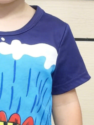 Toddler blue graphic tee with dinosaur print and white cloud detail