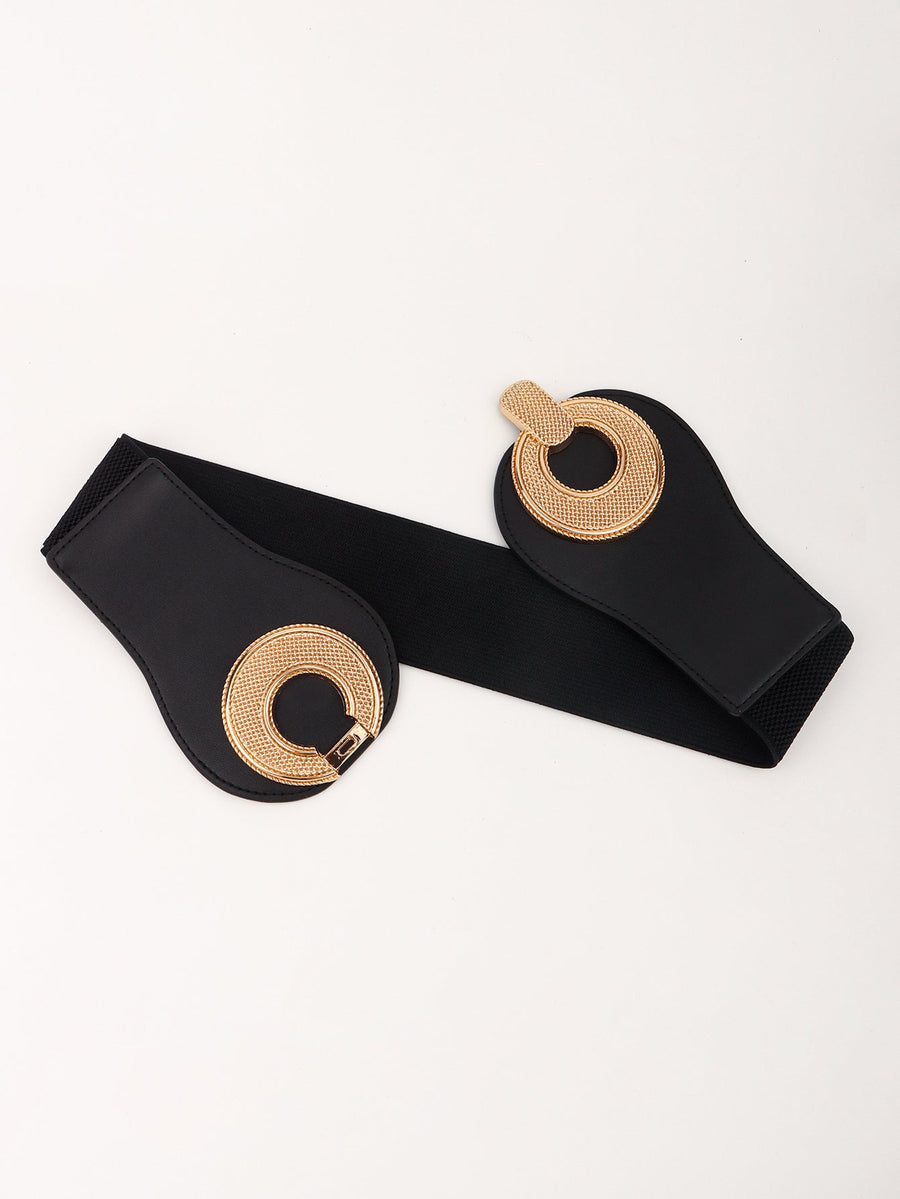 Black elastic belt with sculpted gold metalwork circular detail and clasp.