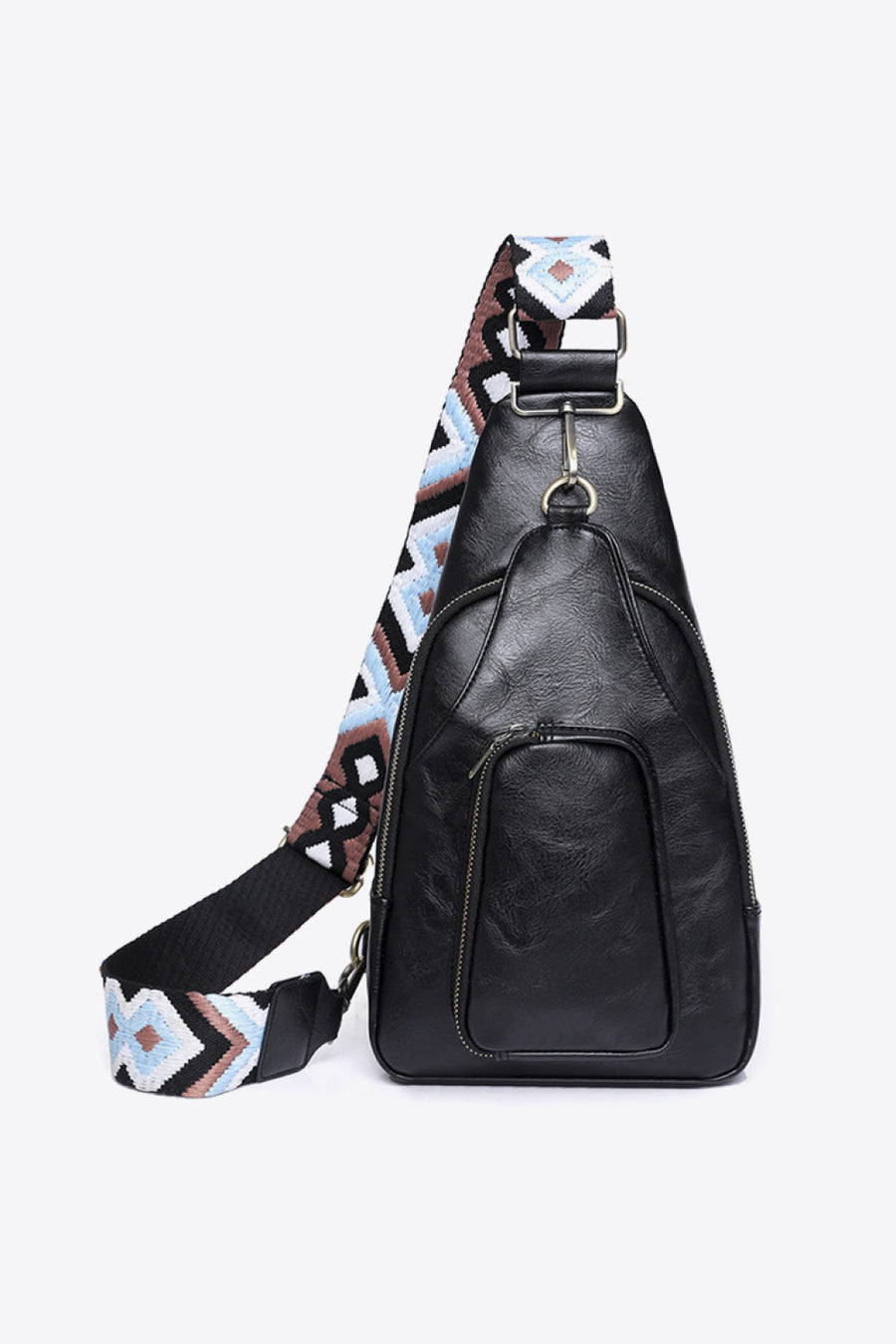 Black PU sling bag with geometric patterned strap and front zip pocket.