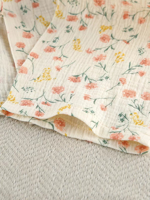 lounge set in peach with tied and cropped top, mini shorts