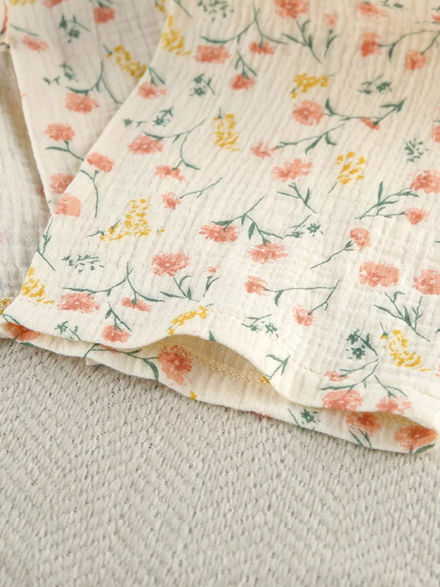 lounge set in peach with tied and cropped top, mini shorts